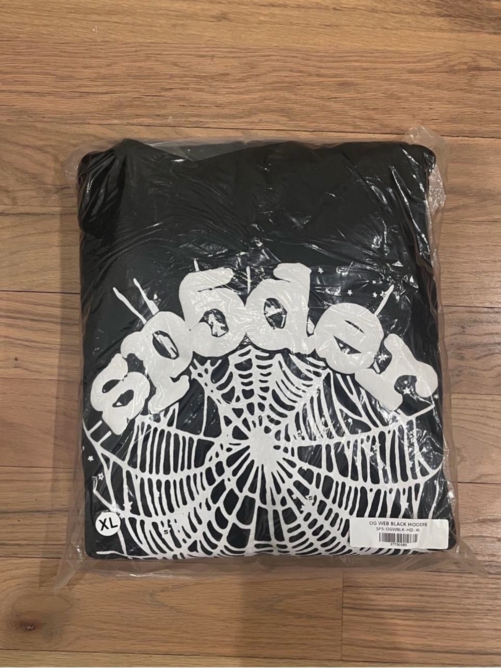 Black SP5DER OG WEB Hoodie with White Spiderweb Design